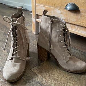 Tan lace up heeled booties with side zipper